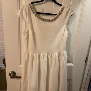 Beautiful White Dress with a rhinestone accent around the neck. Only worn once.